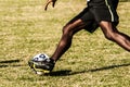 Soccer player legs in action