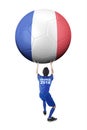 Soccer player lifts ball with flag of France