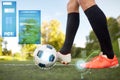 Soccer player playing with ball on football field Royalty Free Stock Photo
