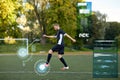 Soccer player playing with ball on football field Royalty Free Stock Photo