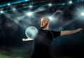 Soccer player receives the ball on his chest in football game Royalty Free Stock Photo