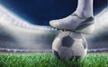 Soccer player with soccerball at the stadium ready for World cup Royalty Free Stock Photo