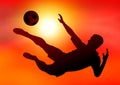 Soccer player on sunset background Royalty Free Stock Photo