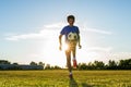 Soccer player kicks ball in a field Royalty Free Stock Photo