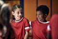 Soccer player before training.Girl and boy friends    before training  in changing room Royalty Free Stock Photo