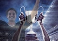 Soccer player wining the cup and two images are superimpose Royalty Free Stock Photo