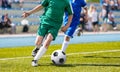 Soccer Players In Action. Football Players Running On The Field Royalty Free Stock Photo