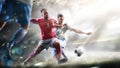 Soccer players in action on the grand stadium background panorama Royalty Free Stock Photo