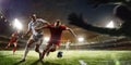 Soccer players in action on sunset stadium background panorama Royalty Free Stock Photo