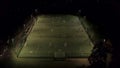 Soccer Practice on a Floodlit Astroturf Pitch