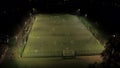 Soccer Practice on a Floodlit Astroturf Pitch