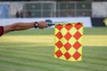 Soccer referee hold the flag. Offside trap Royalty Free Stock Photo