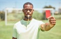 Soccer, referee and red card on the field during a sports match or training for fitness. Workout, sport and football Royalty Free Stock Photo