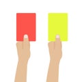 Soccer referees hand holding red and yellow cards. Football judge hand with a card