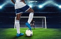 Soccer scene at night match with player kicking the penalty kick Royalty Free Stock Photo