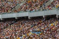 Soccer stadium inside view. football field, empty stands, a crowd of fans, a roof against the sky