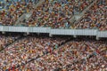 Soccer stadium inside view. football field, empty stands, a crowd of fans, a roof against the sky Royalty Free Stock Photo