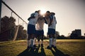 Soccer, sunset or team in a huddle for motivation, goals or group mission on stadium field for a sports game. Match Royalty Free Stock Photo