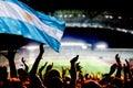 soccer supporters and Argentina flag