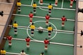 Soccer table game with red and yellow players close-up Royalty Free Stock Photo