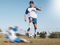 Soccer, tackle and motion blur with a sports man running on a field during a competitive game or training. Football Royalty Free Stock Photo