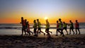 The soccer team, coaching training running outdoor under the beach sunset