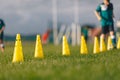 Soccer training camp for kids. Boys practice dribbling in a field. Players develop good soccer dribbling skills Royalty Free Stock Photo