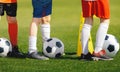 Soccer Training Class. Legs of Children on Football Lesson Royalty Free Stock Photo