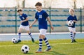 Soccer Training Exercises for Kids. Boys Training with Balls on Summer Football Grass Field Royalty Free Stock Photo