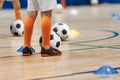 Soccer winter season training for kids. Indoor football soccer practice class for school children