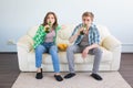 Soccer world cup concept - Modern couple looking excited and happy watching sport game on tv Royalty Free Stock Photo