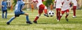 Soccer Youth Teams Play Outdoor Tournament. Young Soccer Players Competition. Boys Kicking Football Ball Royalty Free Stock Photo