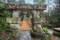 Tiled dolmen and bridge in the Upper Park in the Arboretum in Sochi city, Russia