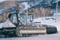 Close up of the Snowcat 'Prinoth' Caterpillar vehicle for maintenance of mountain ski slopes.