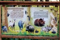 Sochi National Park information billboard at Khmelevskiye mountain lakes representing fauna of Caucasus mountains. Popular tourist