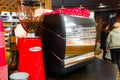 SOCHI,RUSSIA, 18 APRIL 2019 - close up of coffee machine and red cups in the coffee shop