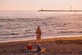 SOCHI,RUSSIA,  23 APRIL 2019 -  woman with children on the beach at sunset Royalty Free Stock Photo