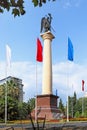 A monumental column with a statue of the Archangel Michael in So
