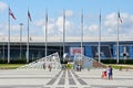 Sochi, Russia, August, 10, 2019. People walking in front of the stand with the results of the winter Olympics Sochi 2014 on the Ma