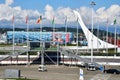 Sochi, Russia, August, 10, 2019. People walking in Sochi Olympic Park. Fountain `Olympic torch` and the ice palace `Iceberg` in th