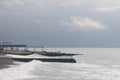 Sochi, Russia 05.07.2021. Breakwater pier summer black sea cloudy Royalty Free Stock Photo