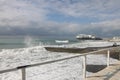 Sochi, Russia 05.07.2021. Breakwater pier summer black sea cloudy Royalty Free Stock Photo