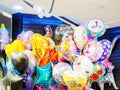 Sochi, Russia - 14 December 2019. Many bright multi-colored balloons of various shapes with patterns and inscriptions