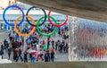 Olympic Park was main venue during Winter Olympic Games held in Sochi. People walk by entrance near waterfall cascade and big