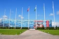 Sochi, Russia, August, 10, 2019. Flags in front of the ice palace `iceberg` in the summer. Sochi, Adler, Olympic Park