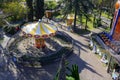 SOCHI, RUSSIA - JANUARY 18, 2023: Top view of the children\'s carousels in the amusement park