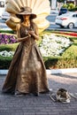 SOCHI, RUSSIA - June 5, 2018: living statue young woman painted in gold