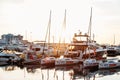 SOCHI, RUSSIA - June 5, 2018: Sailing Yachts And Private Boats Moored At Pier In Sochi Seaport at sunset. Grand Marina Station Co