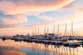 SOCHI, RUSSIA - June 5, 2018: Sailing Yachts And Private Boats Moored At Pier In Sochi Seaport  at sunset. Grand Marina Station Co Royalty Free Stock Photo