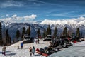 Krasnaya Polyana Resort on a clear sunny day. View of the high mountain peaks covered with snow.